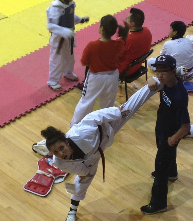 Freshman+Natali+Tzvetkvova+warms+up+before+she+competes.+Tzvetkvova+is+a+nation+TaeKwonDo+champion.