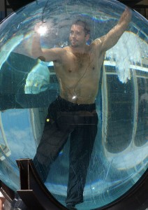 Performance artist and magician David Blaine begins his death-defying stunt as he gets into the water-filled sphere he will spend the next 7 days and night in, on the Plaza at Lincoln Center, in New York, on Monday, May 1, 2006. (Nicolas Khayat/Abaca Press/KRT)