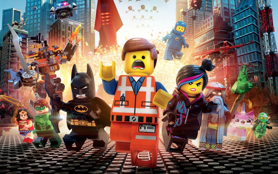 Emmet (center, voiced by Chris Pratt) -- who is believed to be The Special or Master Builder -- joines forces with Batman (Will Arnett), Wyldstyle (Elizabeth Bands), Vitruvious (Morgan Freeman) and others to save the world in The Lego Movie. (COURTESY OF WARNER BROS. PICTURES/MCT)