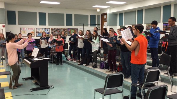 CRESCENDO: Music director Sarah Catt conducts her performers during their first rehearsal of the year. In addition to the vocal rehearsals, blocking and choreography rehearsals are taking place at the same time this year.