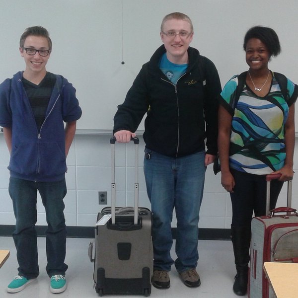 From left to right, sophomore Nic Baggetto, senior Evan Hatfield and junior Szymphoni Harris left in the middle of the school day on April 28 in order to make it to Eastern Illinois University for the competition.