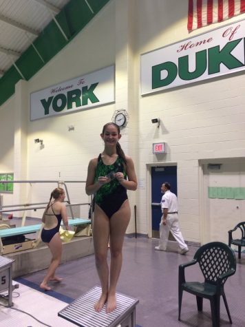 BREAKING RECORDS:
Sophomore Anna Sprenger qualified for state two years in a row, putting in work every single day to qualify this year. This season, Sprenger broke both diving records held at Elk Grove.