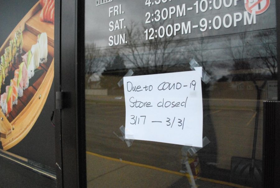 The front doors of Asian Tokyo, a restaurant on Algonquin Road in Rolling Meadows, display a notice of temporary closure in response to the COVID-19 pandemic. Photo by Natalia Habas. (March 29)